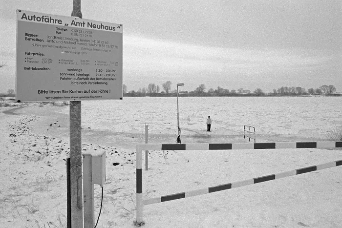 Framed Print : Person on ice rink, ferry dock