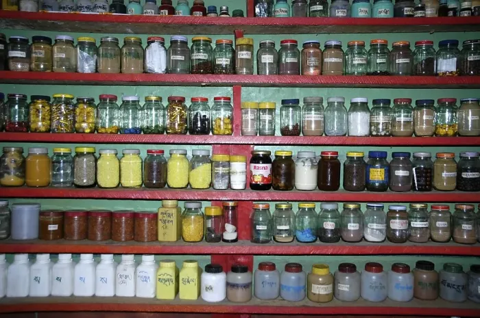 Framed Print : Pharmacy with many glasses in monastery Tashi Gompa Phu Nar-Phu Annapurna Region Nepal