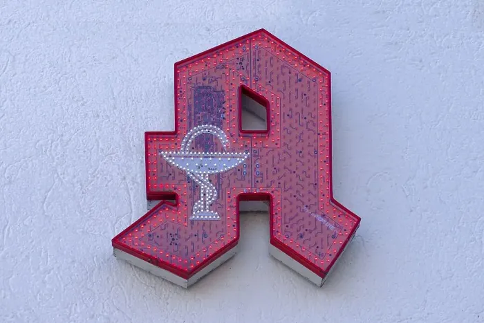 Framed Print : Pharmacy sign on a house wall, Bavaria