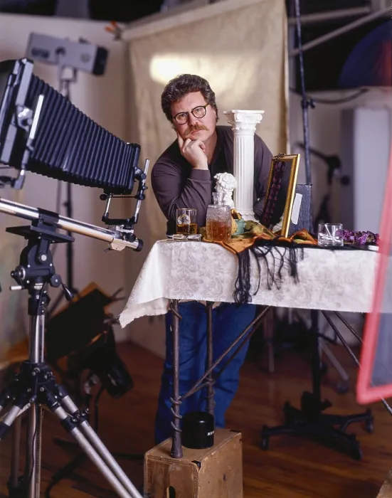 Framed Print : Photographer in a studio setting Framed Print : Photographer in a studio setting