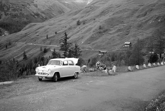 Framed Print : Picnic by British Austin Cambridge A40 car overland adventure trip 1956 on mountain road, Austria, Europe