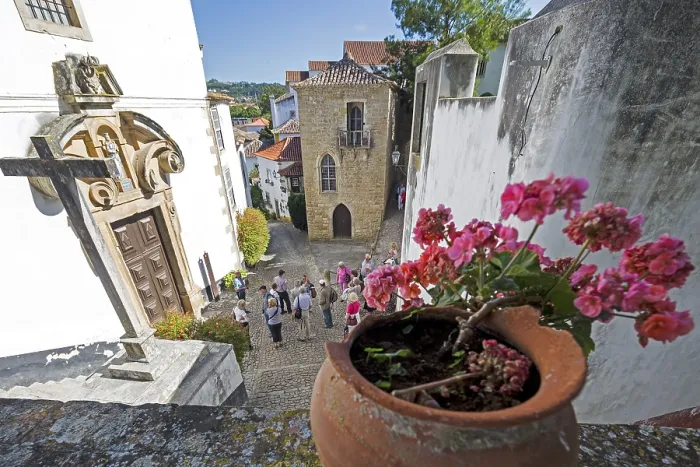 Framed Print : Picturesque alley in the small town of Obidos