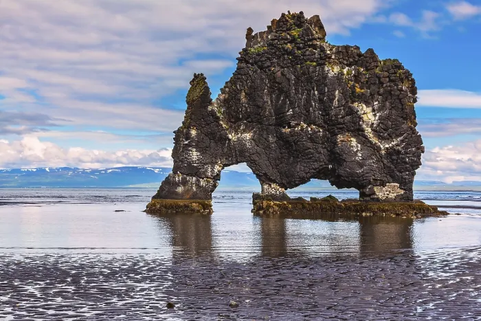 Framed Print : The picturesque cliff in Iceland as huge prehistoric monster