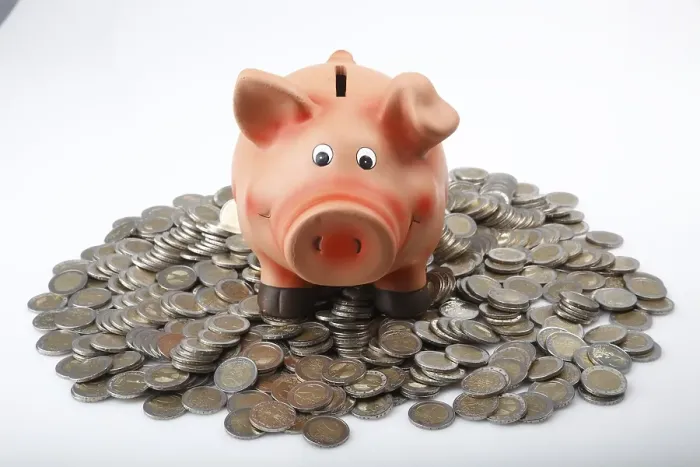 Framed Print : Piggy bank on a pile of euro coins
