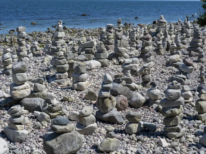 Framed Print : Piled stones on the shore of the island of Stora grundet on the northern tip of the Swedish island of Oland