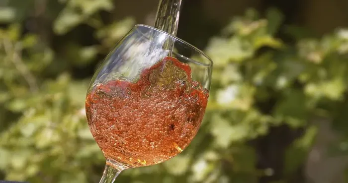 Framed Print : Pink Wine being poured into Glass