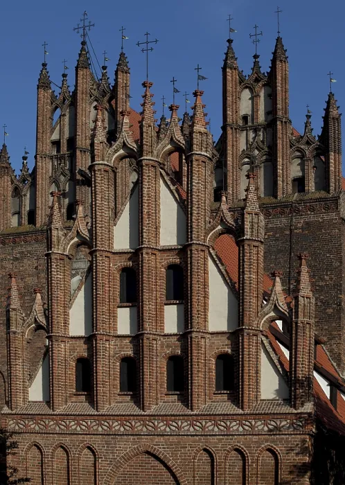 Framed Print : Pinnacles of the west gables of Trinitatis Church and St Anne's Church in front