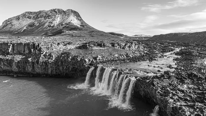 Framed Print : Pjofafoss waterfall, Burfell mountain in the background