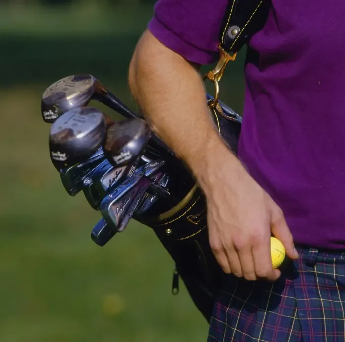 Framed Print : Player with golf bag with club tee and balls Framed Print : Player with golf bag with club tee and balls