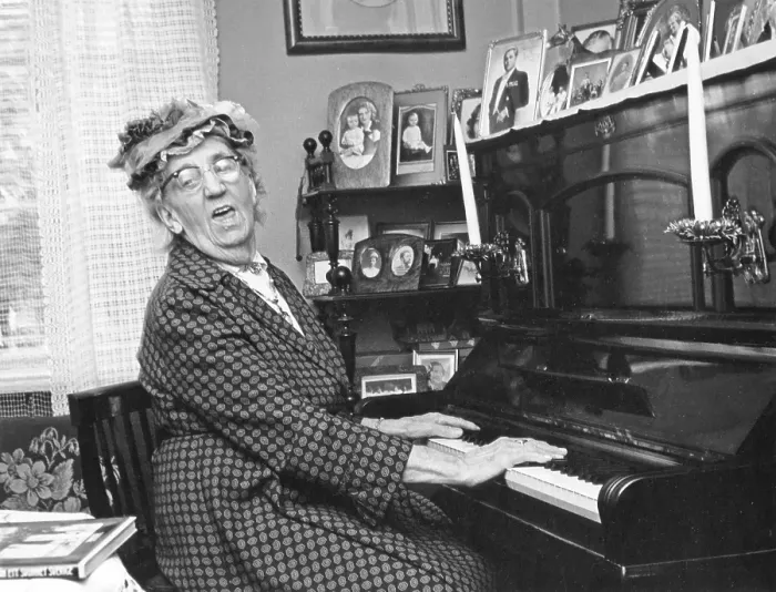 Framed Print : Playing the piano. An elderly lady at the piano, singing the song to accompany the music. She is actress Julia Caesar 1885-1971 at home. Sweden 1965 Framed Print : Playing the piano. An elderly lady at the piano, singing the song to accompany the music. She is actress Julia Caesar 1885-1971 at home. Sweden 1965