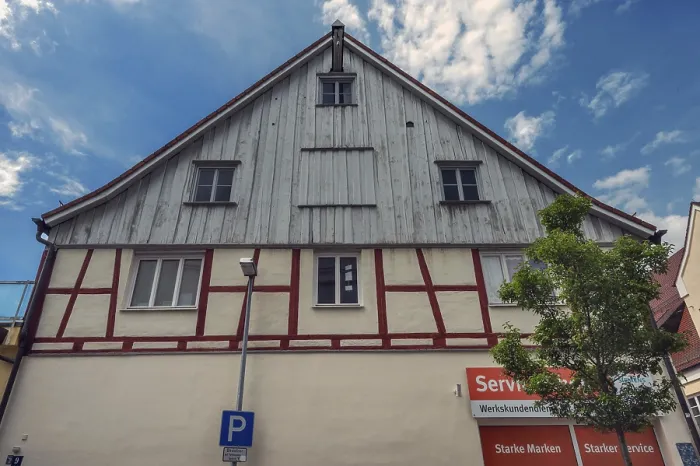 Framed Print : Pointed gable facade with half-timbering and timber panelling Framed Print : Pointed gable facade with half-timbering and timber panelling