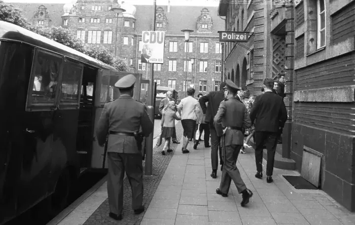 Framed Print : Police action against communists prior to the founding of the German Communist Party (DKP) at a communist meeting ca
