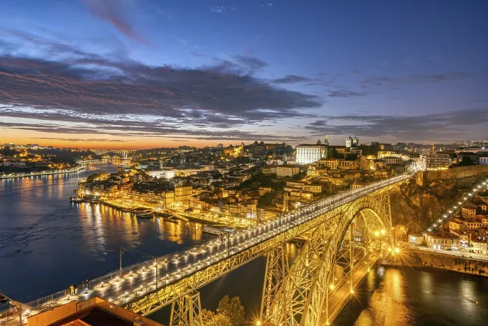 Framed Print : Porto with the Dom Luis I bridge and the Douro river after sunset