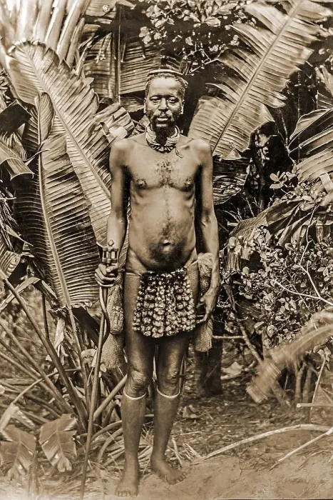 Framed Print : Portrait of an African man in front of banana trees