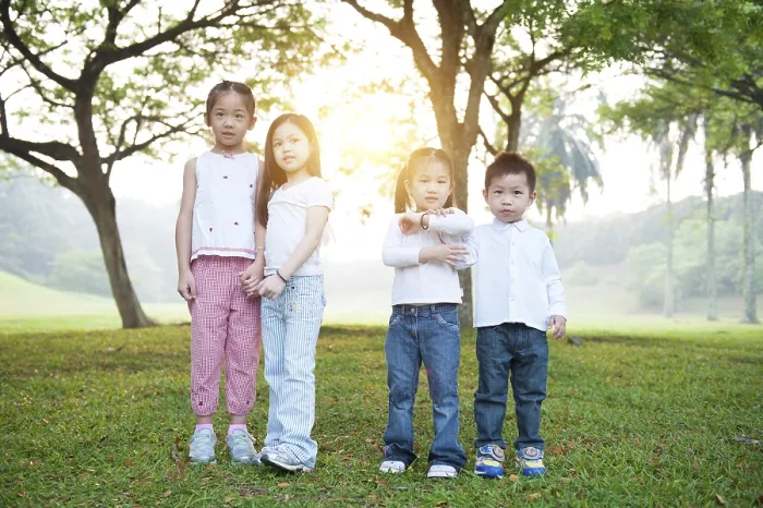 Framed Print : Portrait of Asian children at park Framed Print : Portrait of Asian children at park
