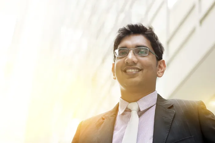 Framed Print : Portrait of handsome Asian Indian business man smiling