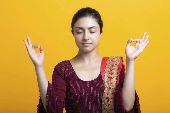 Framed Print : Portrait of young adult indian woman in sari meditate zen like with ok sign mudra gesture