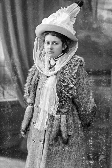 Framed Print : Portrait, young woman with hat looking into the camera