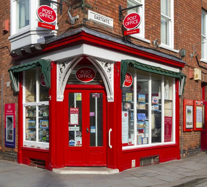 Framed Print : Post Office corner shop painted bright red