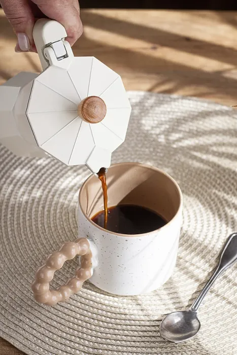 Framed Print : Pouring fresh coffee into a ceramic cup Framed Print : Pouring fresh coffee into a ceramic cup