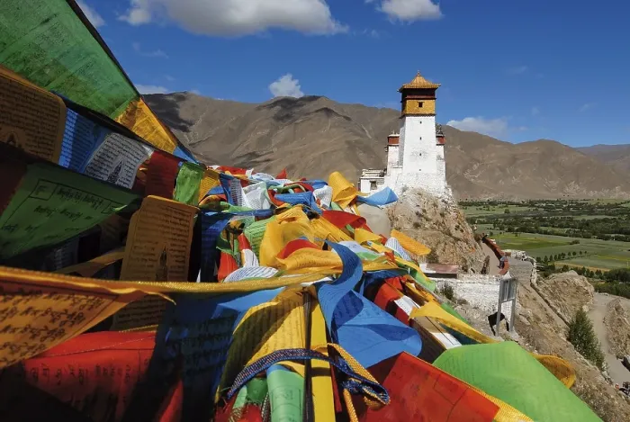 Framed Print : Prayer flags flying above the Yarlung valley on Yumbulagang Palace Framed Print : Prayer flags flying above the Yarlung valley on Yumbulagang Palace