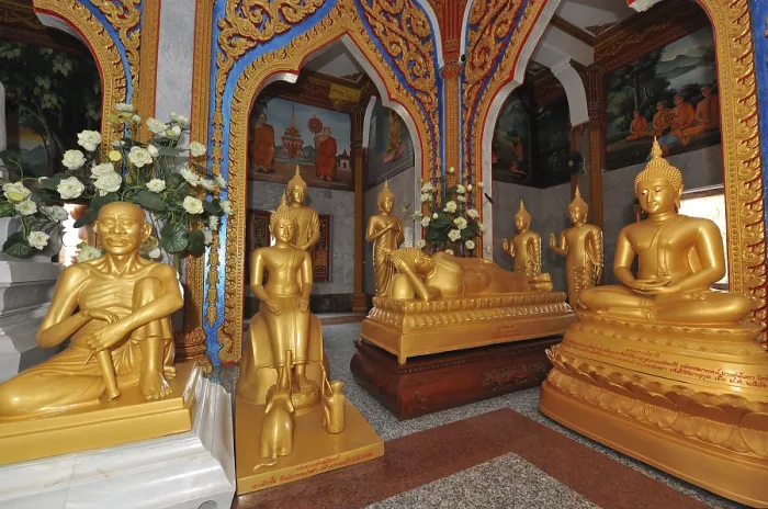 Framed Print : Prayer room devotional room with golden statues from left Monk