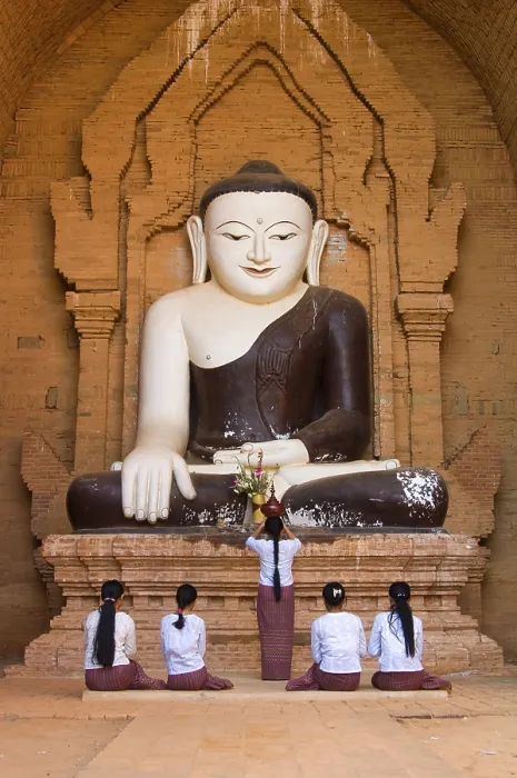Framed Print : Praying believers in front of Buddha statue Framed Print : Praying believers in front of Buddha statue