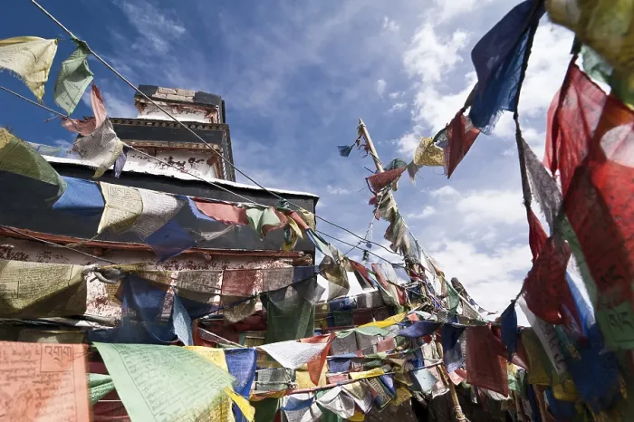 Framed Print : Praying flags over blue sky at Buddhist monastery