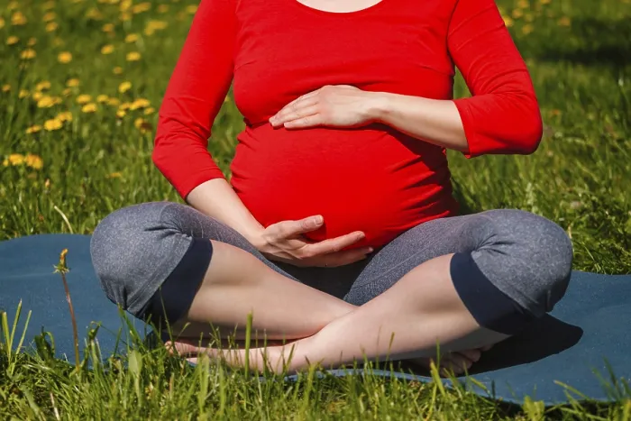 Framed Print : Pregnancy yoga exercise Framed Print : Pregnancy yoga exercise