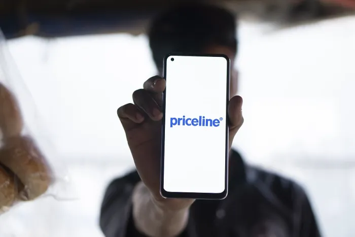 Framed Print : priceline logo is displayed on smartphone Framed Print : priceline logo is displayed on smartphone