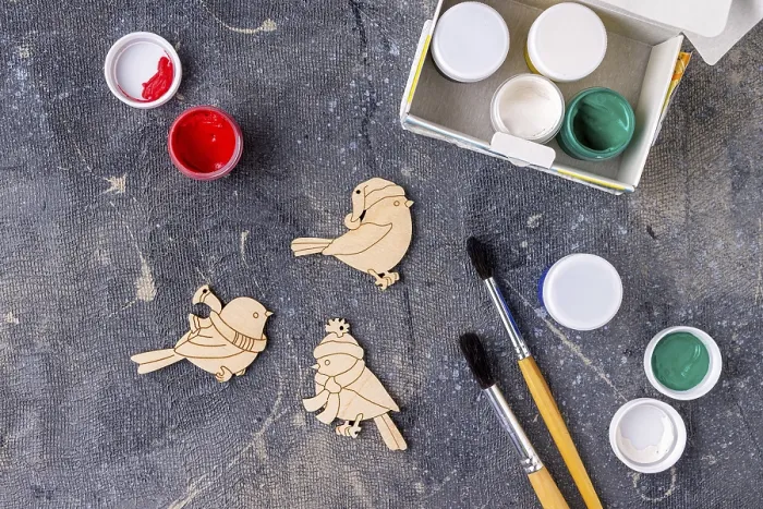 Framed Print : The process of painting wooden toys for the Christmas tree