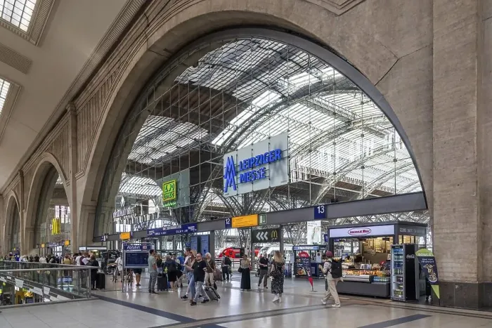 Framed Print : Promenades at the main station with shops and travellers