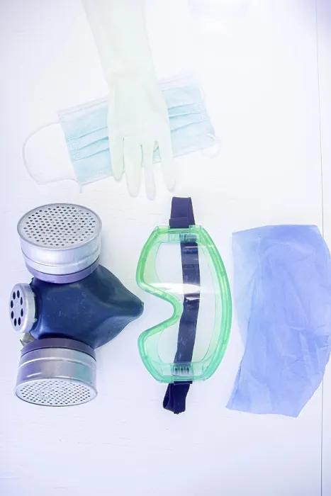 Framed Print : Protective items including mask and gloves on a white backdrop Framed Print : Protective items including mask and gloves on a white backdrop
