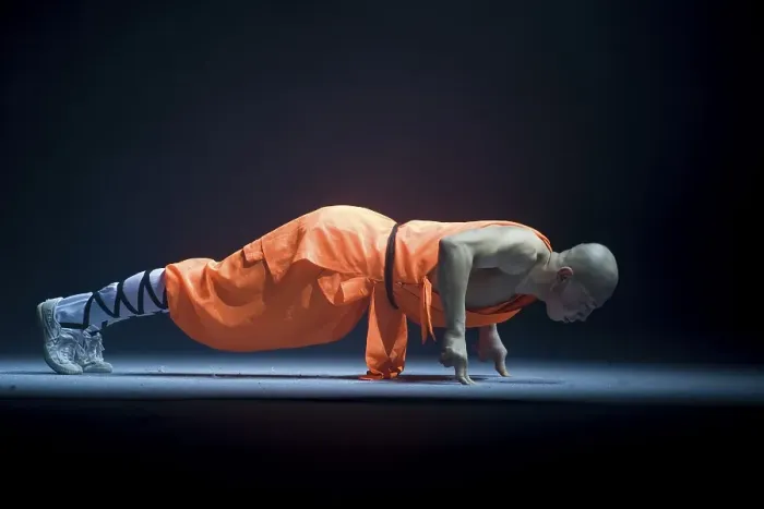 Framed Print : Pushup on two fingers, Shaolin monk during a show on the 22nd of March 2009 in Berlin