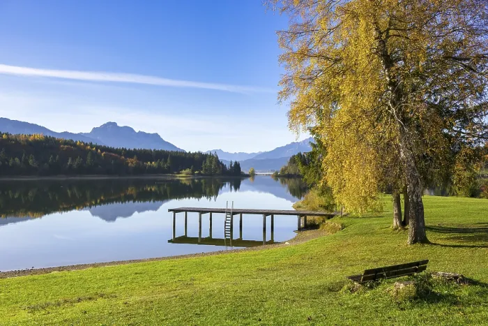 Framed Print : Quiet alpine lake in autumn with jetty