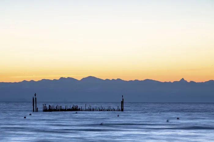Framed Print : Quiet morning atmosphere over the lake with distant mountain silhouettes