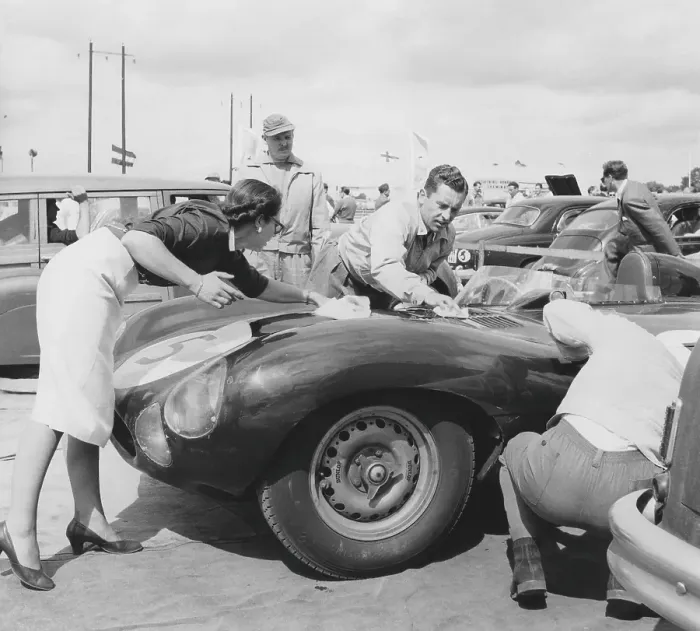 Framed Print : Racing car of the 1950s. The team makes the final polish of the car so it shines and looks good