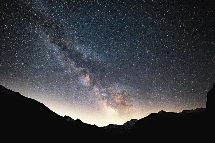 Framed Print : Radiant Milky Way in the sky above silhouetted mountains
