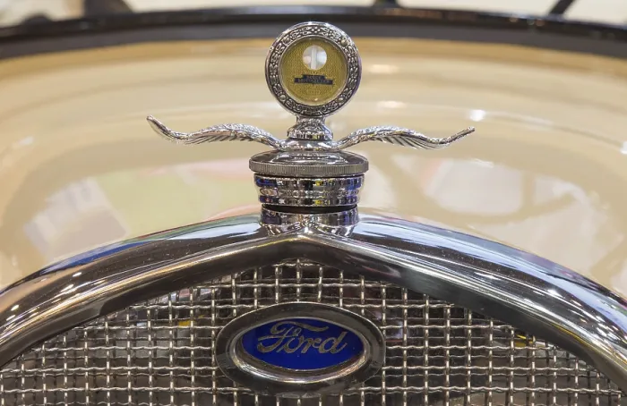 Framed Print : Front with radiator grille and logo of a Ford classic car