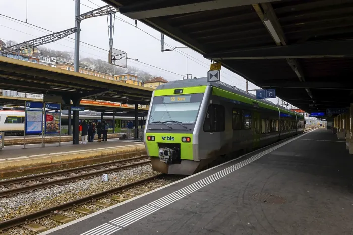 Framed Print : Railroad Station with a Train in City of Neuchatel