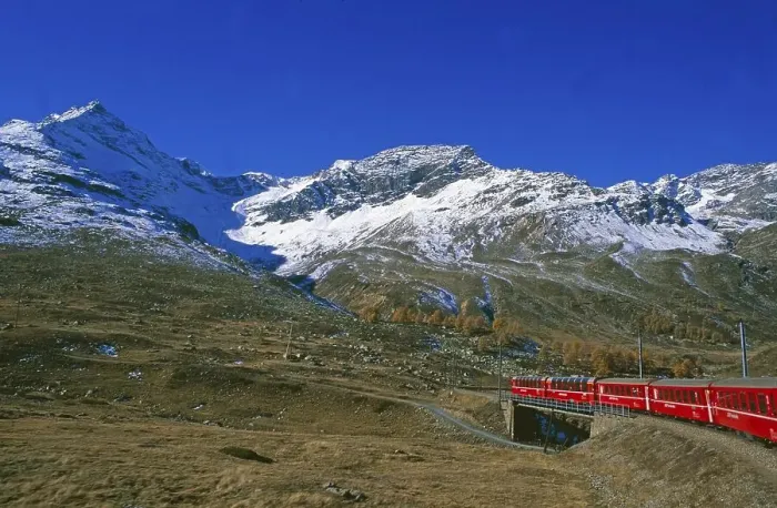 Framed Print : Railway journey on the Rhaetian Railway past Lago Bianco on the Bernina Pass