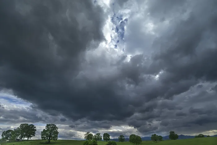 Framed Print : Rain clouds over the Carpathian Mountains