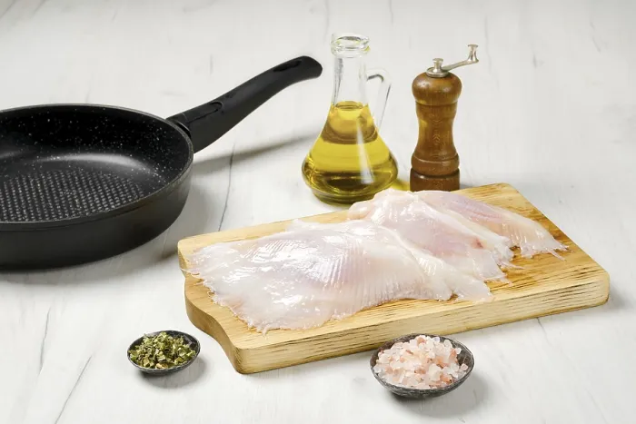 Framed Print : Raw fresh peeled stingray wings ready for frying