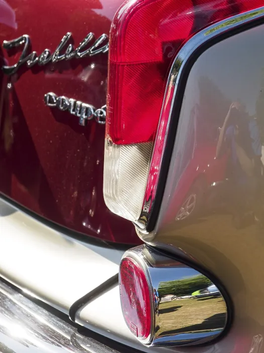 Framed Print : Rear view of a vintage car with red tail light and lettering Framed Print : Rear view of a vintage car with red tail light and lettering