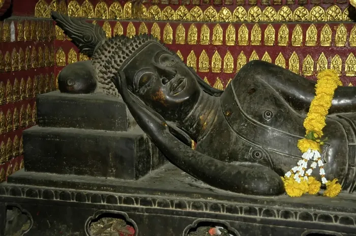 Framed Print : Reclining Budda with small Buddhas in the Wat Xieng Thong Temple