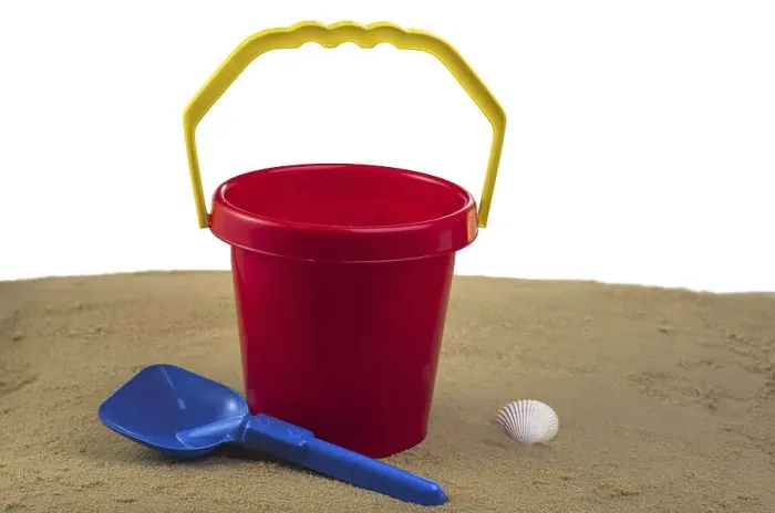Framed Print : Red bucket and blue spade Framed Print : Red bucket and blue spade