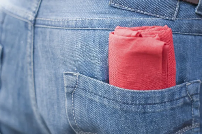 Framed Print : Red Cloth in Jeans Pocket Pune Maharashtra India Asia Aug 2011
