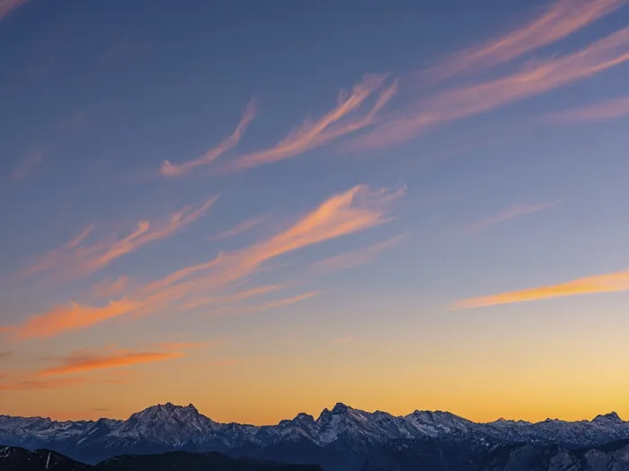 Framed Print : Red-colored plume clouds over the Berchtesgaden Alps at dusk