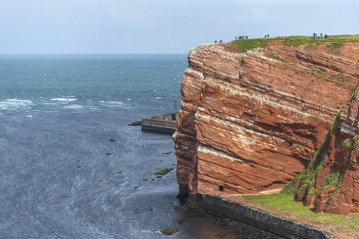 Framed Print : Red coloured sandstone, steep cliff coast of the offshore island of Heligoland