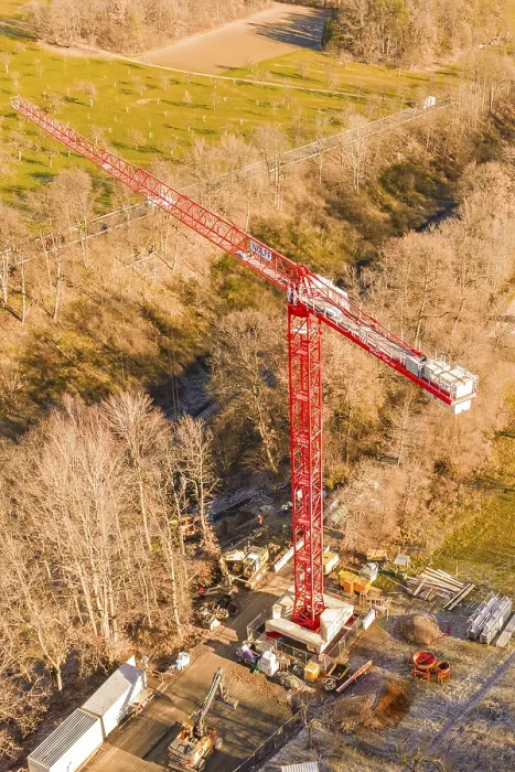 Framed Print : Red crane on a construction site